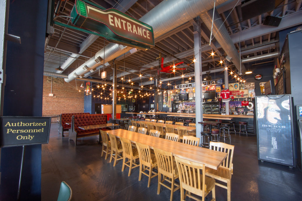 The Bottom Lounge restaurant with long tables and the bar